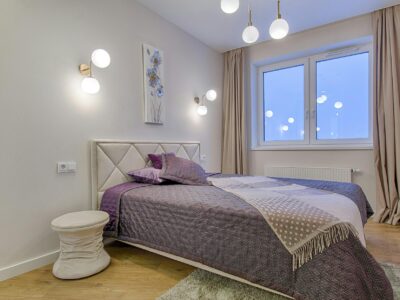 room with bed and wooden floor