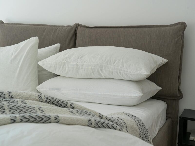 white pillows on a bed